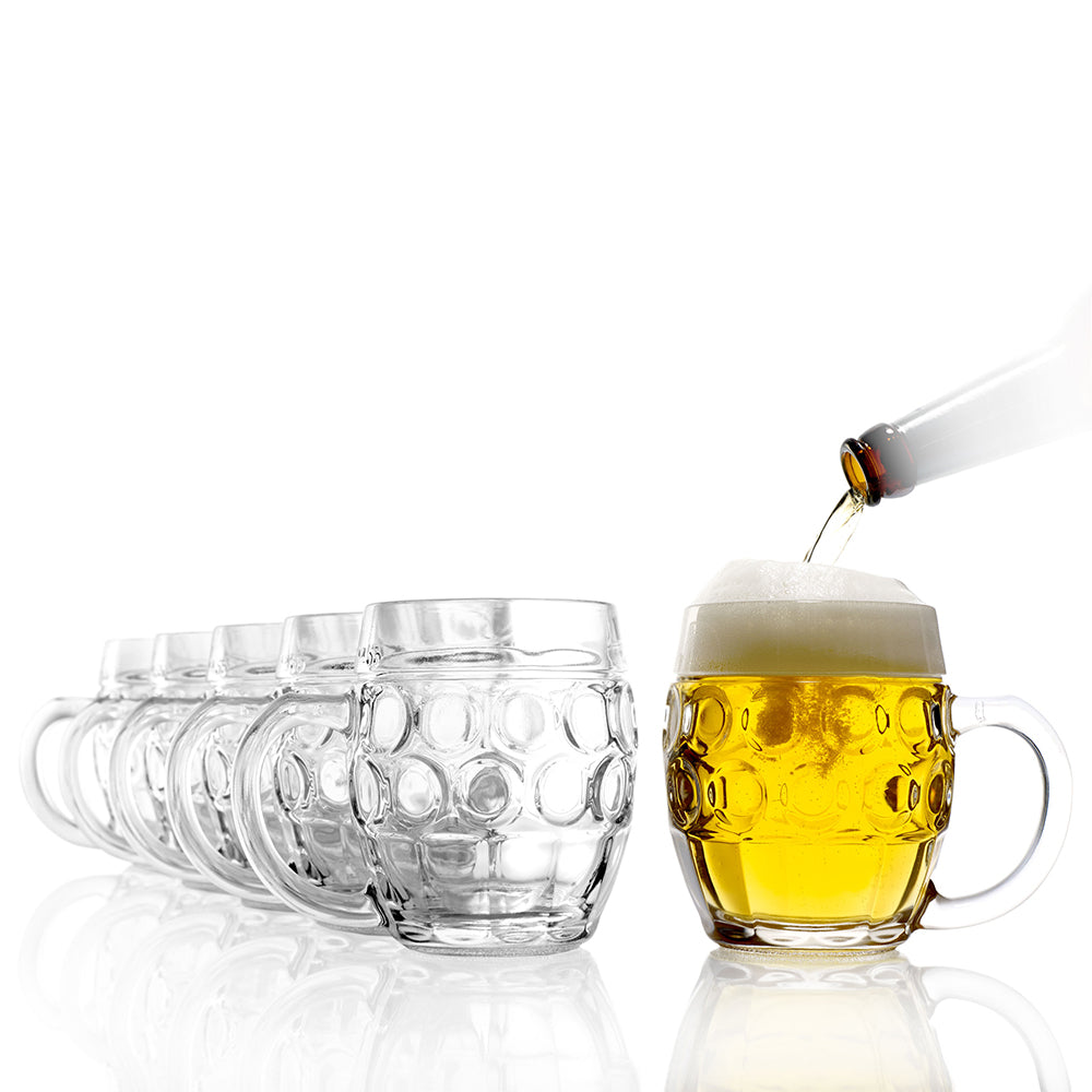 Set mit sechs Bierkrügen Tübinger kaufen, gefüllt mit frisch gezapftem Bier und Schaumkrone